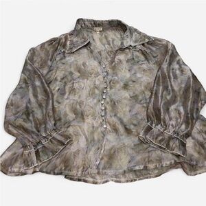 Rose design shear floral blouse. Ruffled collar and sleeves. Size medium.